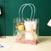 Wholesale of pvc transparent handbags, flower bags, gift bags, waterproof snap fasteners and portable three-piece sets in stock Item Picture